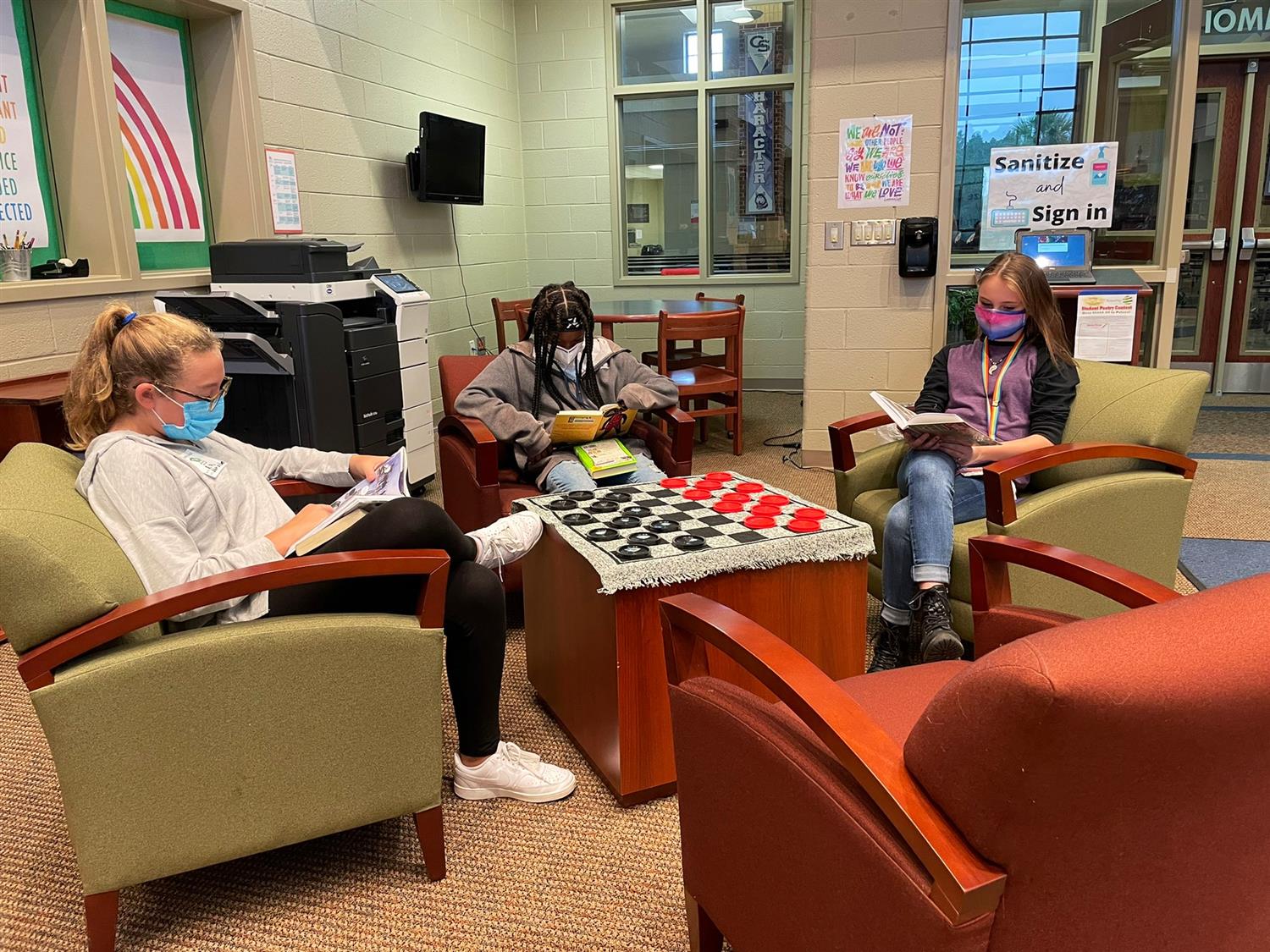 students reading in the CSMS library